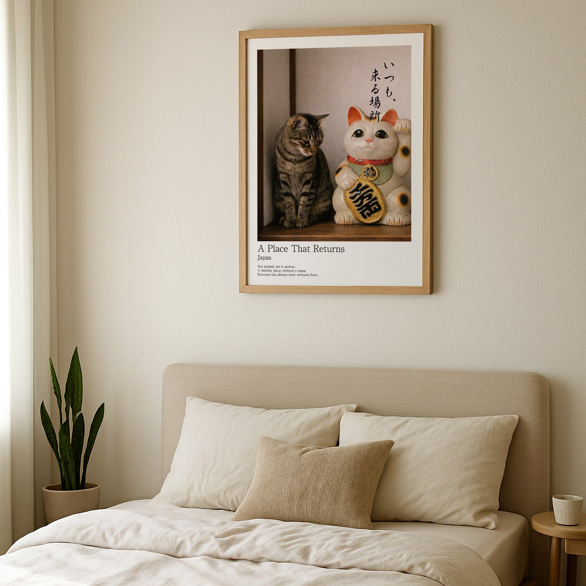 Japanese Maneki Neko wall art in soft neutral Japandi bedroom interior